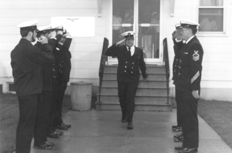61 kilobyte downLoad: picture of being piped ashore. We accept and capture everything, worts and all, notice the number one piece of equipment used in the Navy - a trash can for last memory.